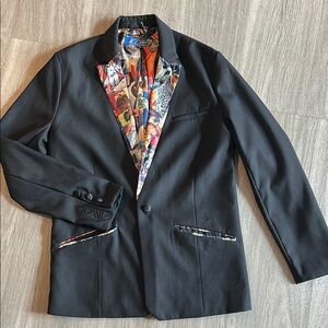 Black blazer product of Volcom by design